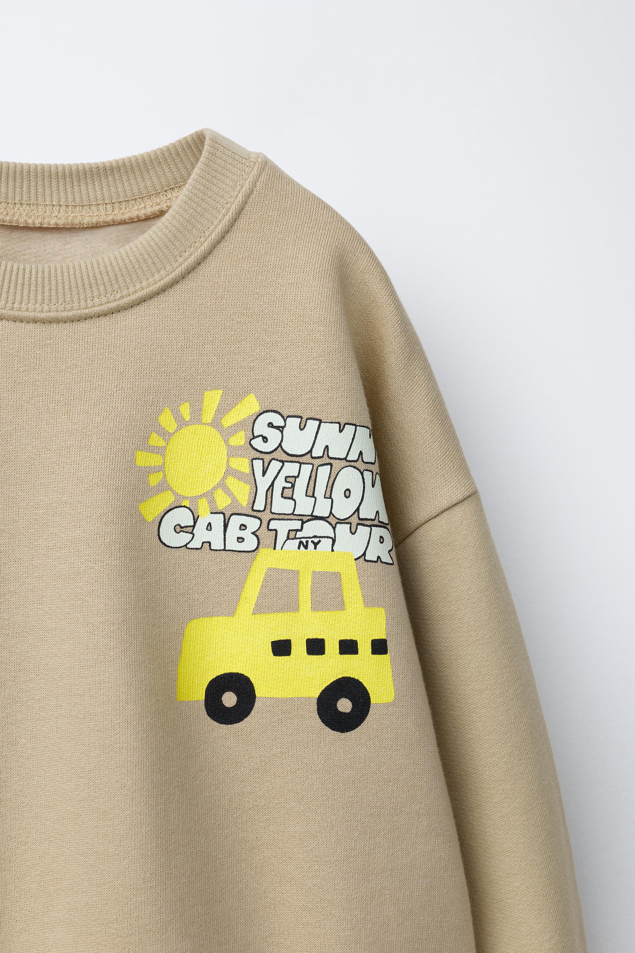TAXI PRINT SWEATSHIRT